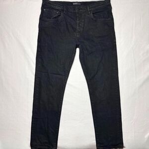 purple brand style P001 black resin 3/D low rise skinny jeans size 38”